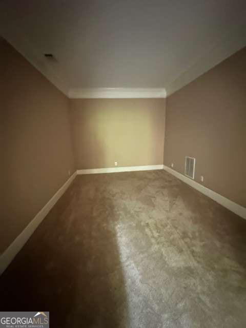 8010 Scudder Way, Ball Ground, GA 30107 - basement featuring crown molding, visible vents, and baseboards
