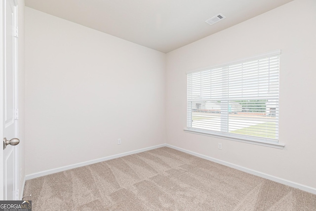 255 Oliver Dr, Locust Grove, GA 30248 - empty room featuring baseboards, visible vents, and carpet