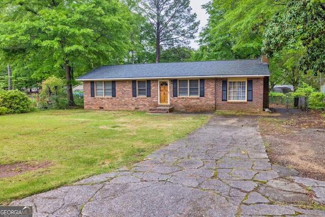 98 Orchard Cir, Commerce, GA 30529 - single story home with fence, a front lawn, crawl space, and brick siding