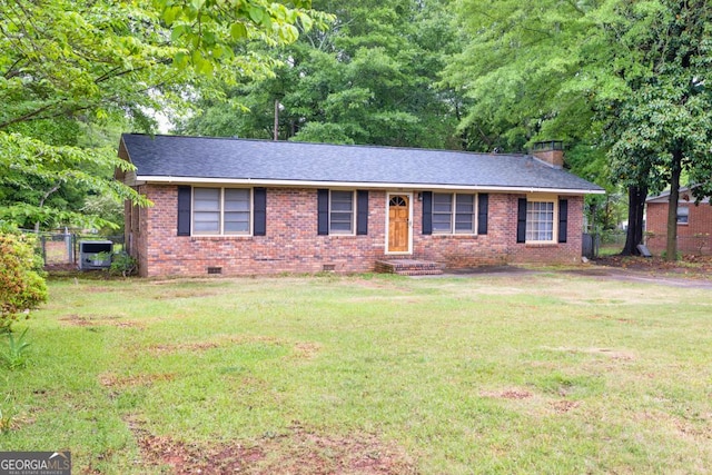 98 Orchard Cir, Commerce, GA 30529 - ranch-style house with a chimney, brick siding, a front lawn, and crawl space