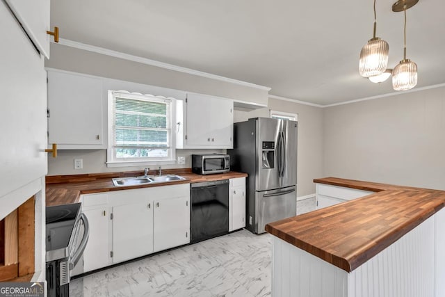 98 Orchard Cir, Commerce, GA 30529 - kitchen featuring butcher block counters, stainless steel appliances, white cabinets, and a sink