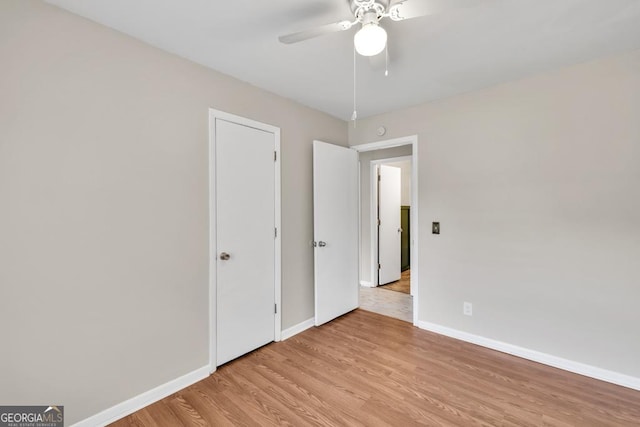 98 Orchard Cir, Commerce, GA 30529 - unfurnished room featuring baseboards, ceiling fan, and light wood finished floors