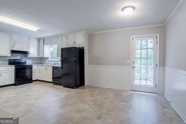 3664 Satellite Ter, Ellenwood, GA 30294 - kitchen with white cabinetry, black appliances, light countertops, custom range hood, and ornamental molding