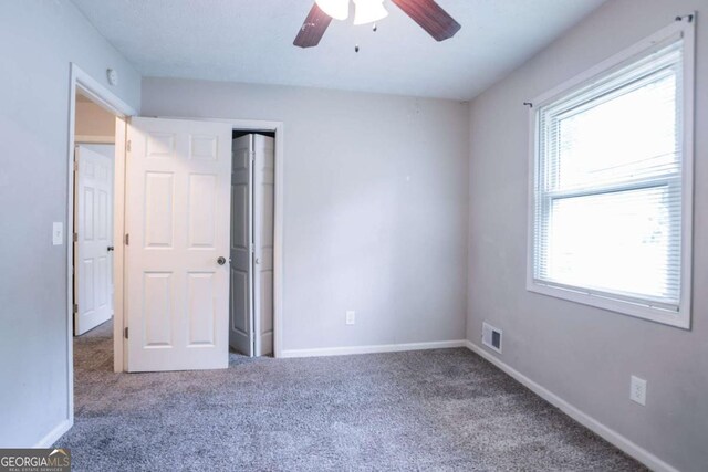 3664 Satellite Ter, Ellenwood, GA 30294 - interior space featuring carpet flooring, multiple windows, and visible vents
