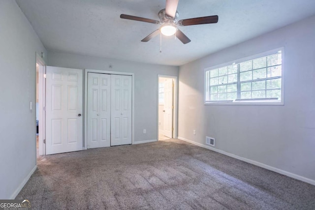 3664 Satellite Ter, Ellenwood, GA 30294 - unfurnished bedroom with a closet, visible vents, baseboards, and carpet floors