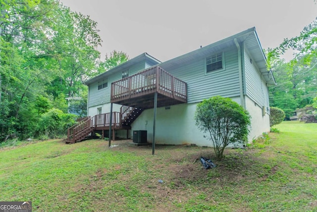 3664 Satellite Ter, Ellenwood, GA 30294 - rear view of property with a lawn, central AC, a wooden deck, and stairs