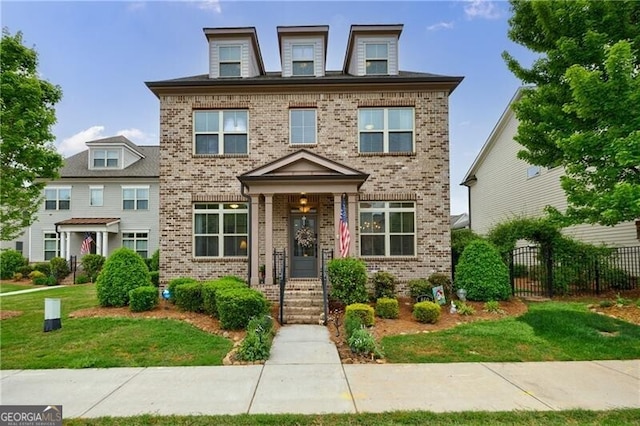 860 Hargrove Point Way, Alpharetta, GA 30004 - view of front of property featuring a front yard, fence, and brick siding