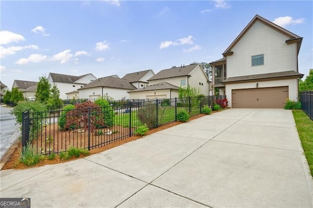 860 Hargrove Point Way, Alpharetta, GA 30004 - view of front facade with fence, a residential view, concrete driveway, and an attached garage