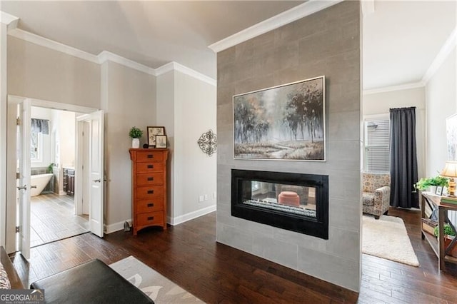 860 Hargrove Point Way, Alpharetta, GA 30004 - living area featuring baseboards, wood finished floors, crown molding, and a fireplace
