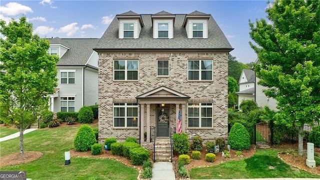 860 Hargrove Point Way, Alpharetta, GA 30004 - view of front of home with fence, a front lawn, and brick siding