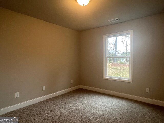 68 Davis Lake Rd Lot 16, Thomaston, GA 30286 - carpeted spare room featuring visible vents and baseboards