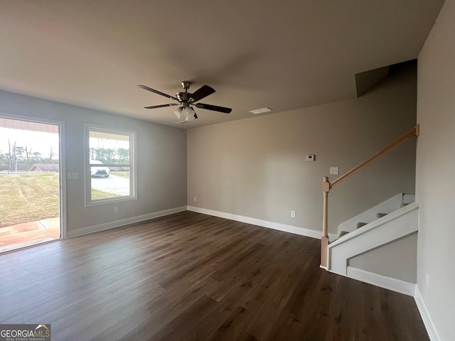 68 Davis Lake Rd Lot 16, Thomaston, GA 30286 - spare room featuring visible vents, ceiling fan, baseboards, stairway, and dark wood-type flooring