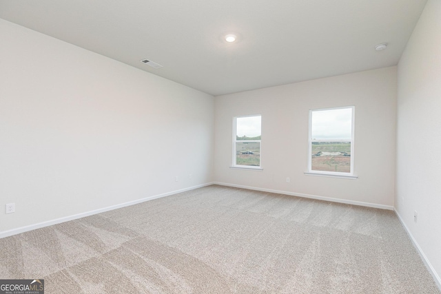 239 Oliver Dr, Locust Grove, GA 30248 - carpeted spare room with recessed lighting, visible vents, and baseboards