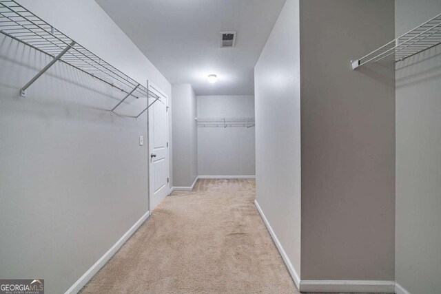 535 Pierpoint Dr, Atlanta, GA 30331 - walk in closet with visible vents and carpet floors