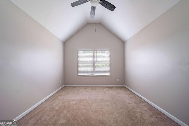 535 Pierpoint Dr, Atlanta, GA 30331 - carpeted empty room featuring vaulted ceiling, baseboards, and a ceiling fan