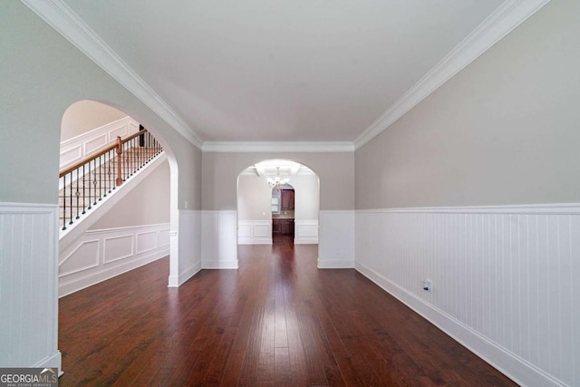 535 Pierpoint Dr, Atlanta, GA 30331 - additional living space featuring wainscoting, stairs, wood-type flooring, and arched walkways