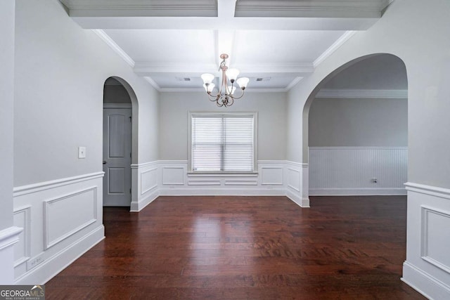 535 Pierpoint Dr, Atlanta, GA 30331 - unfurnished dining area with wood finished floors, coffered ceiling, a notable chandelier, wainscoting, and arched walkways