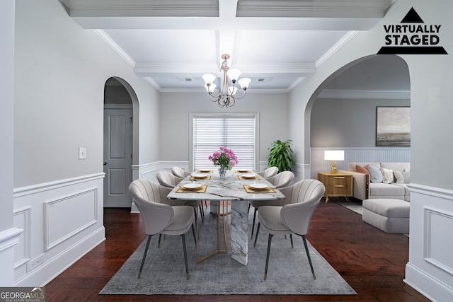 535 Pierpoint Dr, Atlanta, GA 30331 - dining room with ornamental molding, wood finished floors, arched walkways, and a notable chandelier