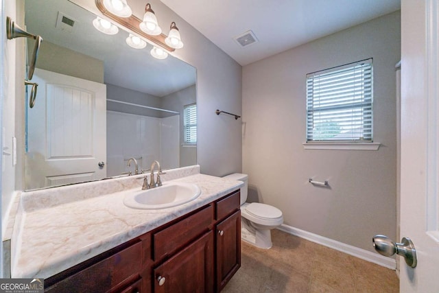 535 Pierpoint Dr, Atlanta, GA 30331 - full bathroom featuring toilet, visible vents, baseboards, a shower, and vanity