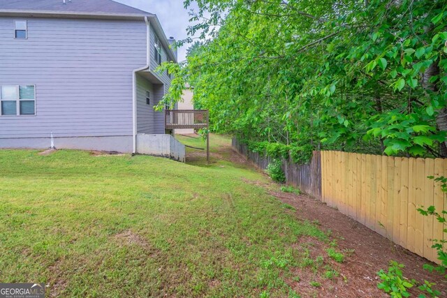 535 Pierpoint Dr, Atlanta, GA 30331 - view of yard with a deck and fence