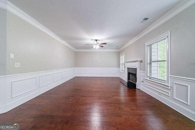 535 Pierpoint Dr, Atlanta, GA 30331 - unfurnished living room featuring a ceiling fan, a fireplace, visible vents, dark wood-type flooring, and ornamental molding