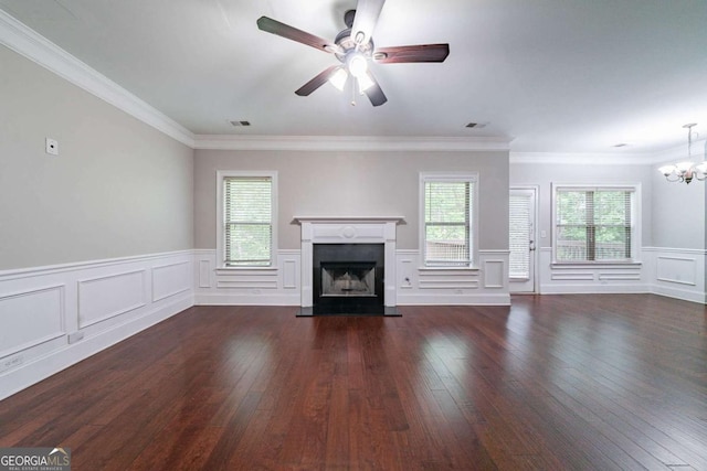 535 Pierpoint Dr, Atlanta, GA 30331 - unfurnished living room featuring a decorative wall, wood finished floors, a fireplace with raised hearth, and ceiling fan with notable chandelier
