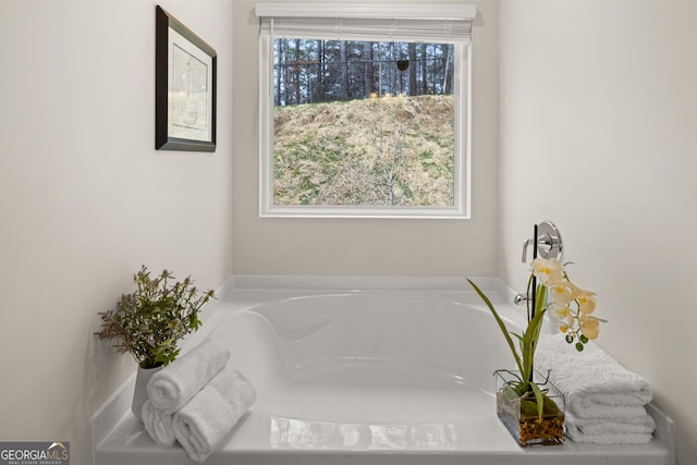 full bath with a bath
