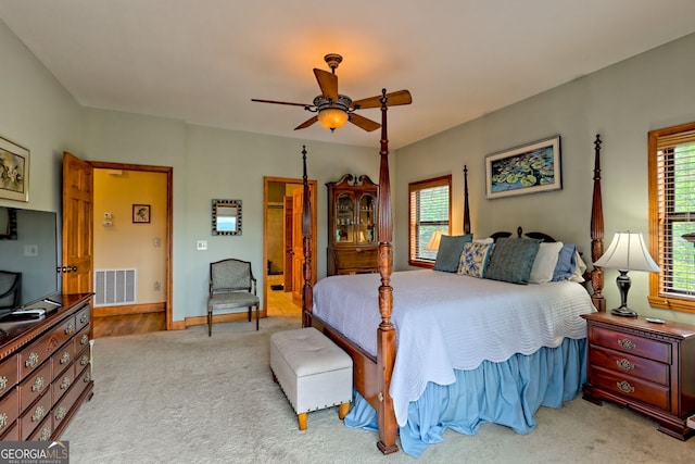 2608 The Rdgs, Hiawassee, GA 30546 - bedroom featuring carpet flooring, multiple windows, ceiling fan, and baseboards