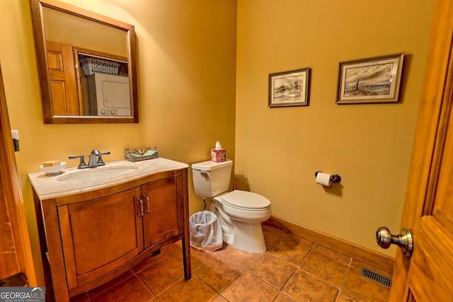 2608 The Rdgs, Hiawassee, GA 30546 - half bathroom featuring vanity, toilet, baseboards, and tile patterned floors