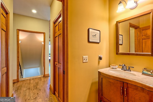 2608 The Rdgs, Hiawassee, GA 30546 - bathroom with vanity and wood finished floors