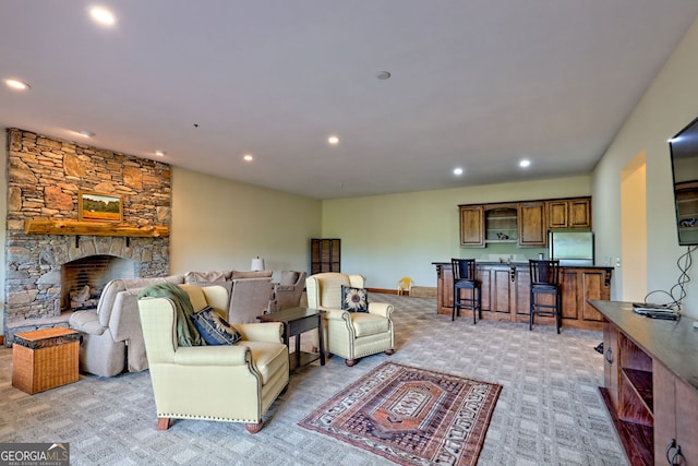 2608 The Rdgs, Hiawassee, GA 30546 - living area with light colored carpet, recessed lighting, bar, and a fireplace