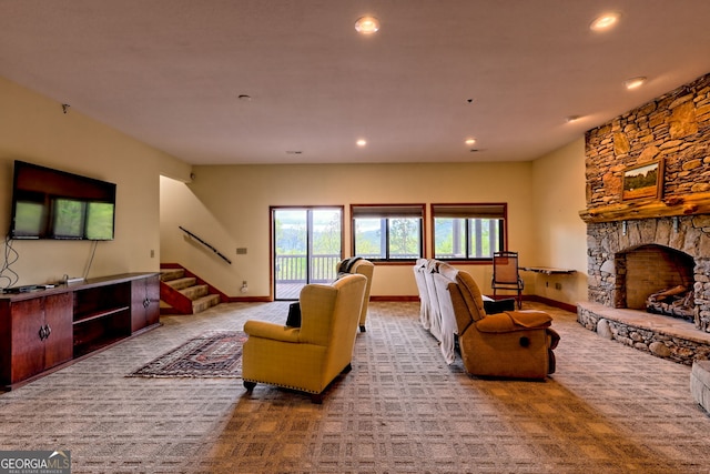 2608 The Rdgs, Hiawassee, GA 30546 - living area featuring carpet floors, stairway, recessed lighting, a stone fireplace, and baseboards