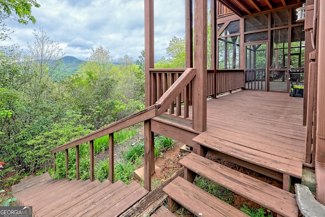 2608 The Rdgs, Hiawassee, GA 30546 - deck featuring a mountain view, a sunroom, and a forest view