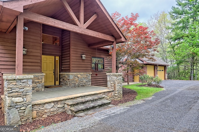 2608 The Rdgs, Hiawassee, GA 30546 - entrance to property with stone siding and a garage