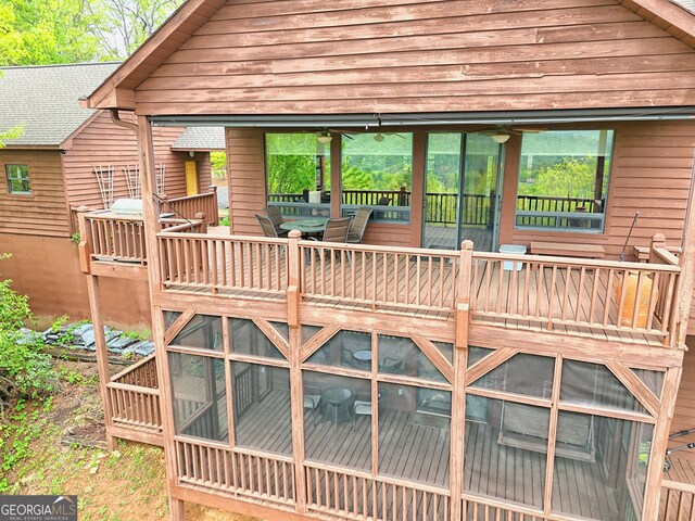 2608 The Rdgs, Hiawassee, GA 30546 - rear view of house featuring a deck and outdoor dining space