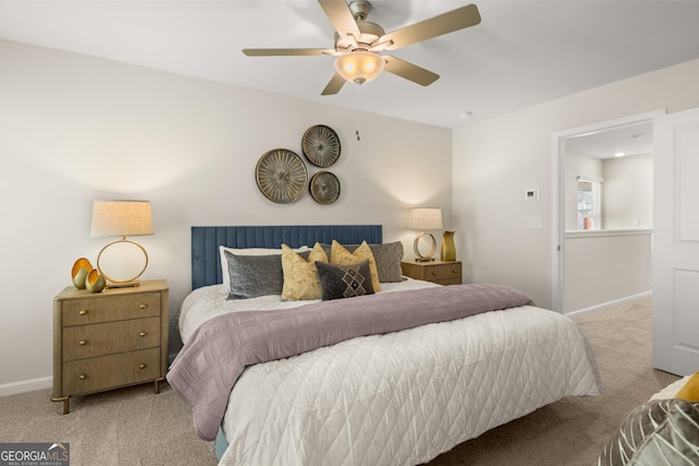 bedroom featuring baseboards, carpet, and a ceiling fan