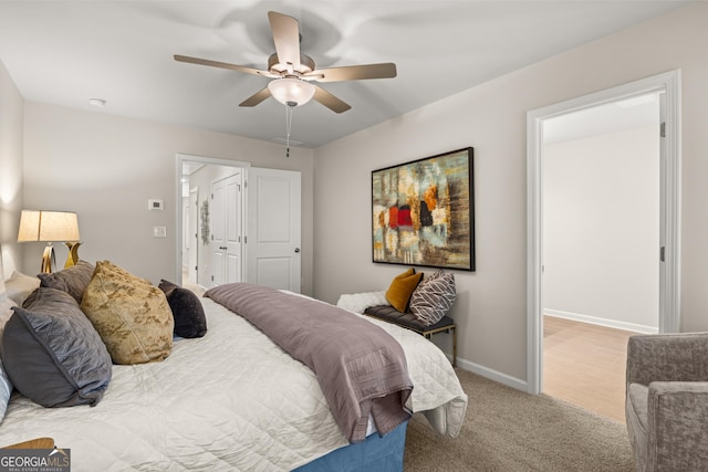 bedroom with carpet floors, baseboards, and ceiling fan
