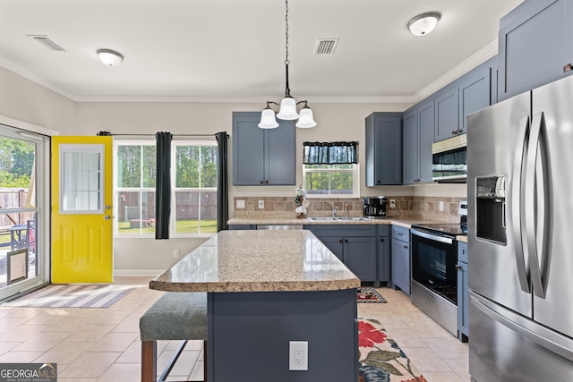 kitchen with light tile patterned flooring, visible vents, and stainless steel appliances