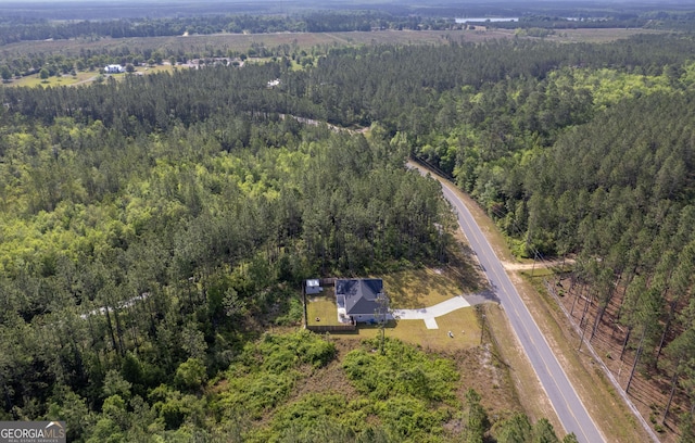 aerial view featuring a forest view