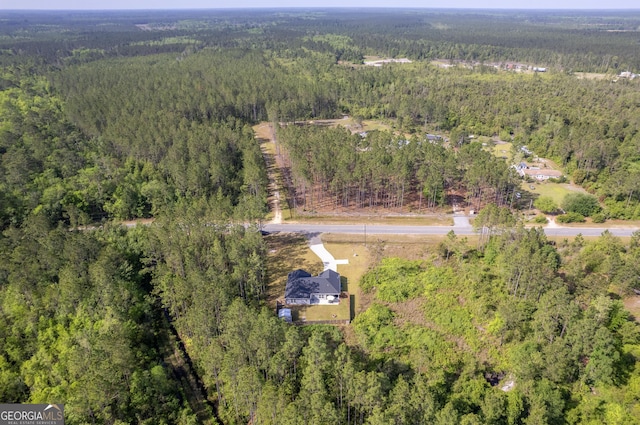 aerial view with a wooded view