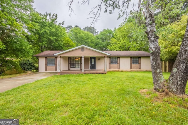 110 Valley View Ct, Tyrone, GA 30290 - ranch-style home featuring concrete driveway, a front yard, a porch, and fence