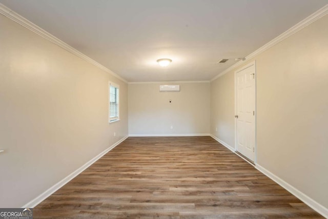 110 Valley View Ct, Tyrone, GA 30290 - spare room with baseboards, visible vents, crown molding, and wood finished floors