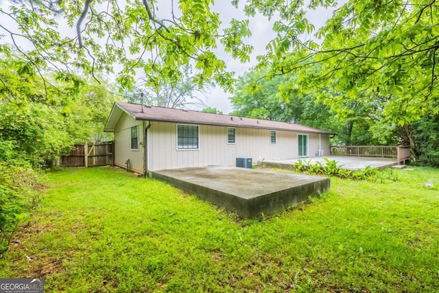 110 Valley View Ct, Tyrone, GA 30290 - rear view of property with a patio area, fence, a lawn, and central AC unit