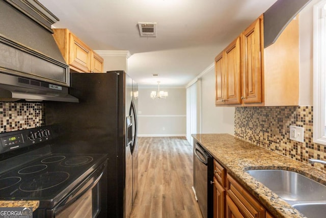 110 Valley View Ct, Tyrone, GA 30290 - kitchen with a sink, a notable chandelier, electric range, under cabinet range hood, and dishwasher