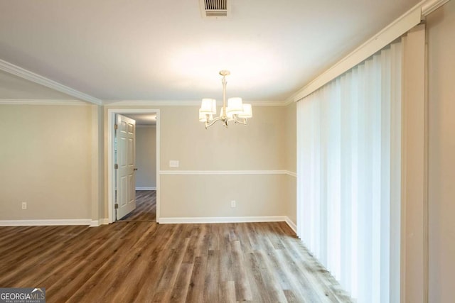 110 Valley View Ct, Tyrone, GA 30290 - unfurnished dining area with wood finished floors, crown molding, visible vents, baseboards, and a chandelier