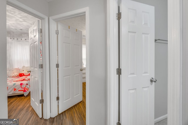 1029 Megan Ct, Sugar Hill, GA 30518 - hall featuring wood finished floors