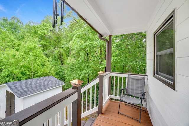 1029 Megan Ct, Sugar Hill, GA 30518 - wooden terrace with a storage shed and an outdoor structure