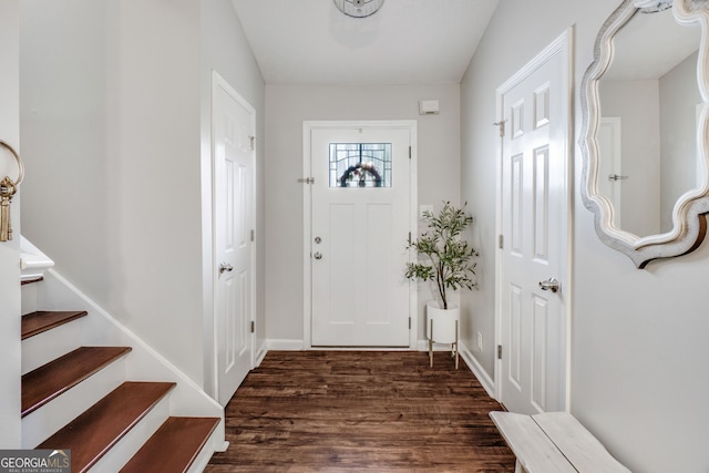 1029 Megan Ct, Sugar Hill, GA 30518 - entryway with dark wood-type flooring, baseboards, and stairs