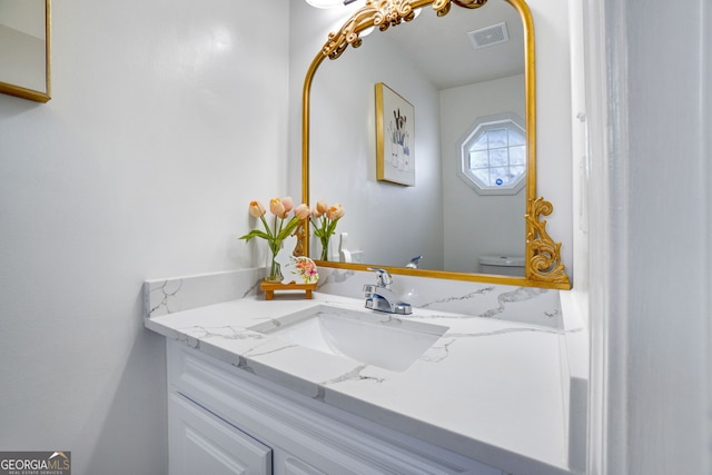 1029 Megan Ct, Sugar Hill, GA 30518 - bathroom with vanity and toilet