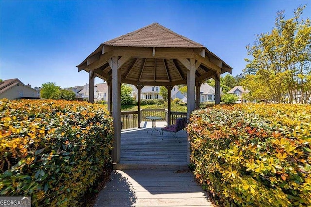 view of community with a gazebo and a deck